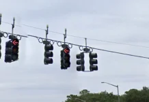 Why These Blue Lights Are Suddenly Appearing Above Traffic Signals | Carscoops